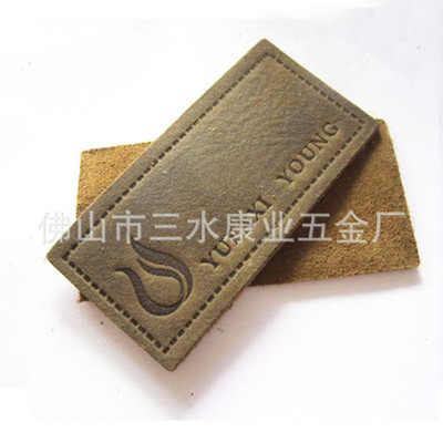 佛山市三水康業(yè)五金廠 專業(yè)提供中高檔熱壓絲印皮標(biāo)皮牌，助力服裝服飾品牌升級